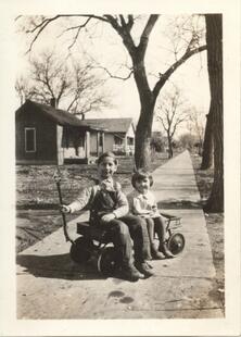 b1-74 Cicil Lucille Dawson in cecil's wagon c 1930